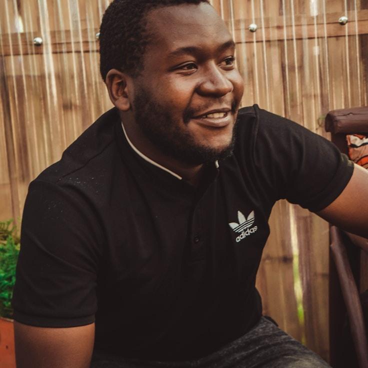 Kaveri Mehta, Lead Design Curator at HarborFernPlume, reviewing corporate floral arrangements